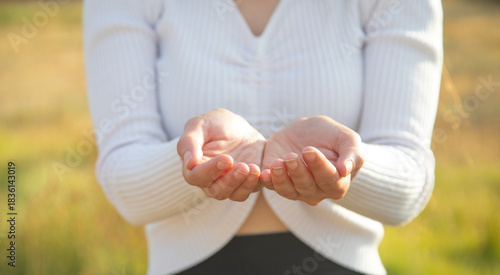 Young caucasian girl showing empty hands.