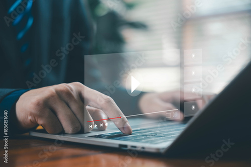 businessman using a laptop, video music player interface, concept of digital content creation, online media streaming, virtual webinar education on a live platform, multimedia technology business
