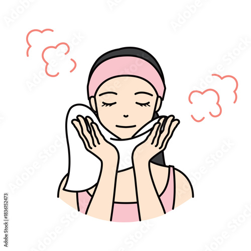 Woman applying a warm towel to her face to open up pores