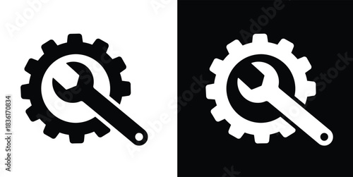 A split image showing a black gear with a white wrench on a white background and a white gear with a black wrench on a black background.