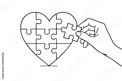 A hand is holding a puzzle piece of a heart. The puzzle is incomplete, and the person is trying to put it back together