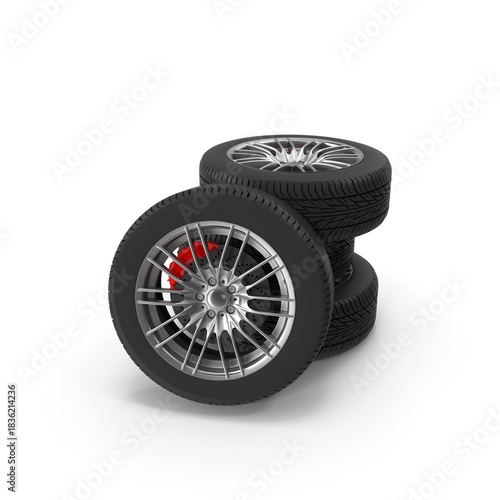 stack of four new black car tires