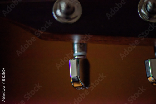 A sharp close-up photograph of an acoustic guitar highlighting its strings, wood texture, and craftsmanship. Ideal for music, instruments, creativity, and artistic product themes.