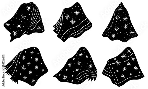 Collection of six black and white patterned shawls with stars and lines in various shapes and styles