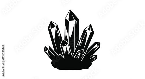 Cluster of black crystals on a white background, symbolizing raw energy and natural formation