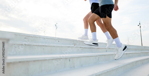 Running up stairs at a public space during daytime