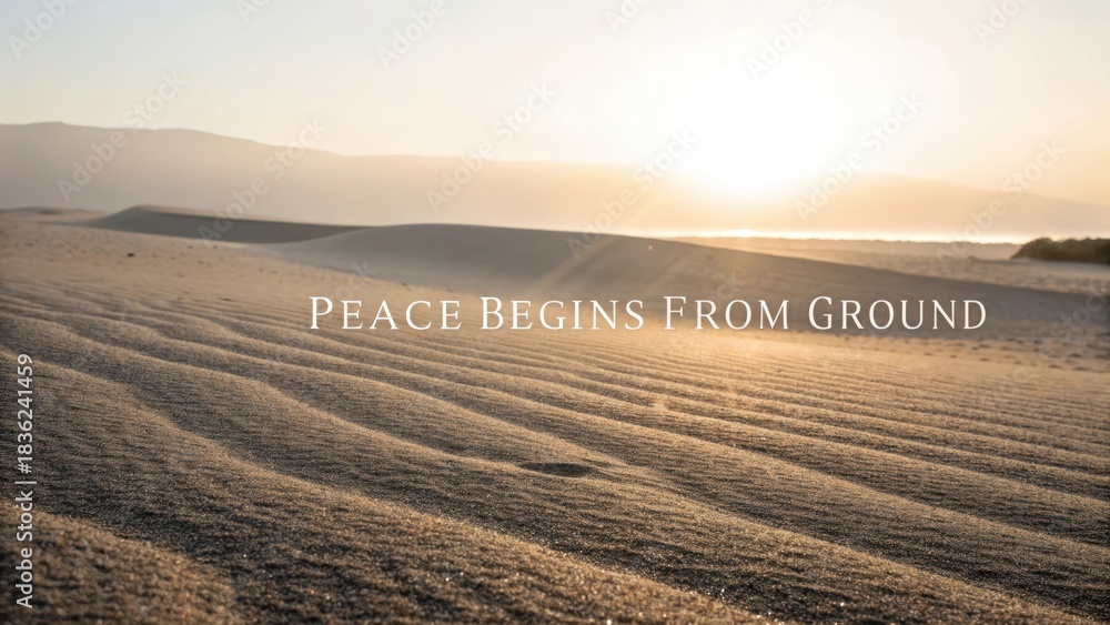 Obraz premium A serene desert landscape with a warm morning light spreading across the sand