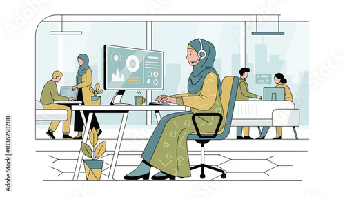 Female worker in hijab at office desk using laptop.