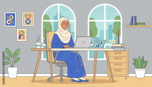 Woman in hijab working at desk in office.
