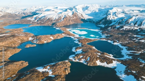 Wallpaper Mural Aerial view of snow-covered mountains and turquoise lakes in a remote Arctic landscape Torontodigital.ca
