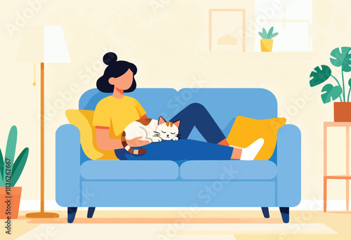 A person with a bun sits on a blue couch, cuddling a cat. Plants, window, and lamp in a cozy home