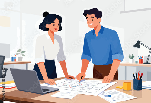 Two people, a woman and a man, at a desk analyzing a plan with lines on it. A laptop and office supplies are also present