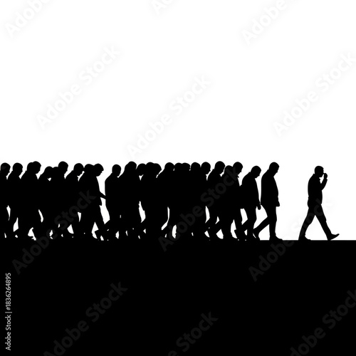 Silhouette of a man walking away from a crowd of people.