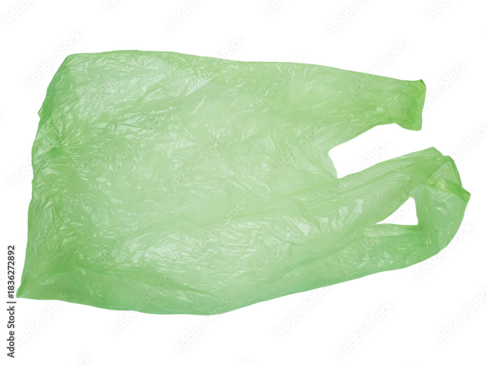 Fototapeta premium Green disposable shopping bag isolated on a transparent background. Real Low-Density Polyethylene plastic bag. LDPE shopper, plastic waste and pollution.
