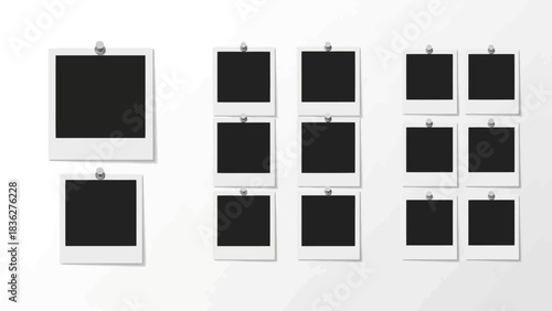 Collection of blank instant photo frames pinned on a white background