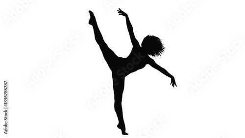 Woman dancing freely in silhouette