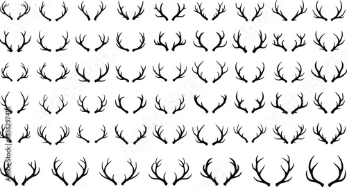 Large collection of vector black silhouettes featuring deer antlers and elk horns, isolated on white background, hunting trophy design element set