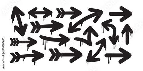 Set of hand drawn graffiti arrows with paint drips on white background black graphic elements street art style