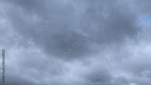 Shooting of a cloudy sky that gets darker