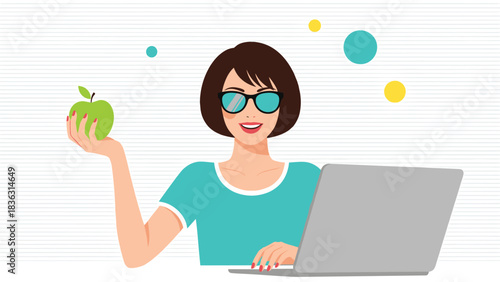 Happy woman with glasses working on a laptop computer while holding a fresh green apple, promoting a healthy work lifestyle.