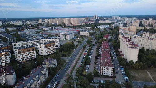 Wallpaper Mural 
Smooth drone footage flying toward the Warsaw city skyline during a warm summer sunset. The video captures the Vistula River, extensive green areas, residential neighborhoods, and a major highway fil Torontodigital.ca