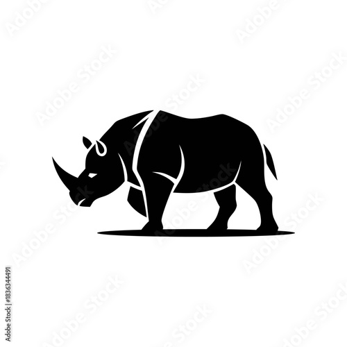 Silhouette illustration of a rhinoceros standing, showcasing its powerful build and prominent horn, set against a clean white background.