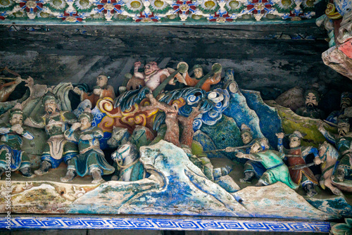 The exquisite wood carvings on the stage of Huaxi Tower in Bozhou City, Anhui Province, China. The Flower Theatre was first built in the Qing Dynasty.

