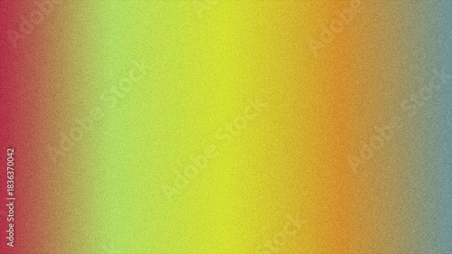 Granular abstract texture softly transitions across a vibrant gradient spanning from red through yellow to blue