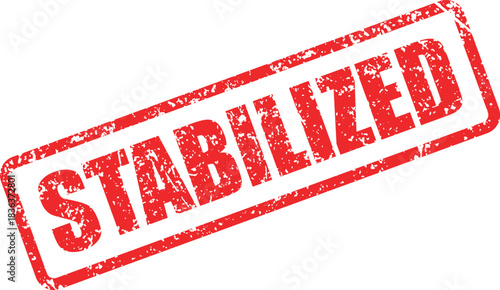 Distressed stabilized red rubber stamp angled on a transparent backdrop signifies validation assurance