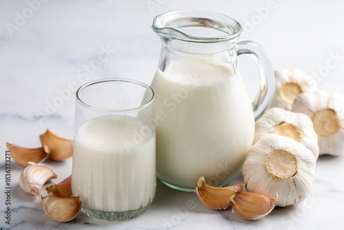 Hot garlic milk in a glass ...