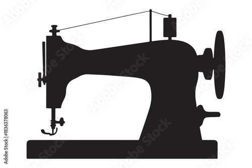  Vintage sewing machine in a stark black silhouette on a white background