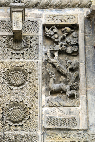 The exquisite brick carvings on the flower Theatre archway in Bozhou City, Anhui Province, China. The Flower Theatre was first built in the Qing Dynasty.