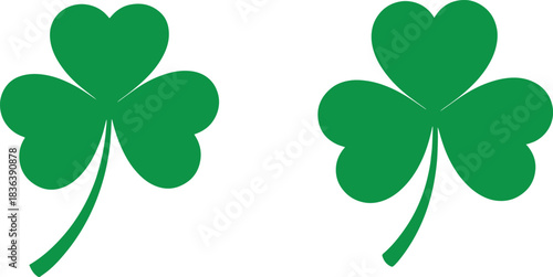 Two vibrant green shamrock silhouettes one featuring an adobe illustrator icon