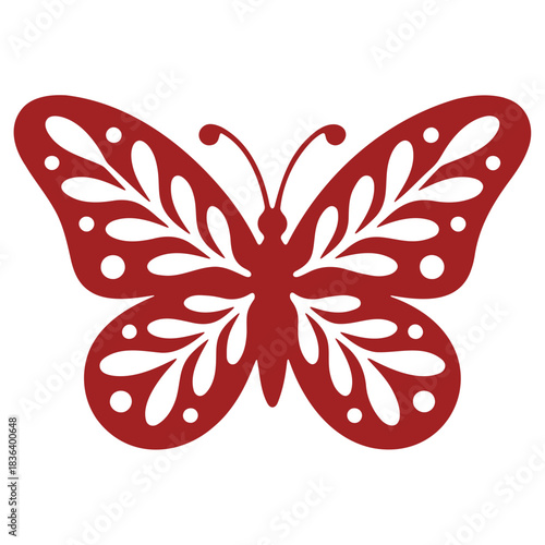 Detailed red butterfly with leaf and circle cutouts on wings against a white background view from front