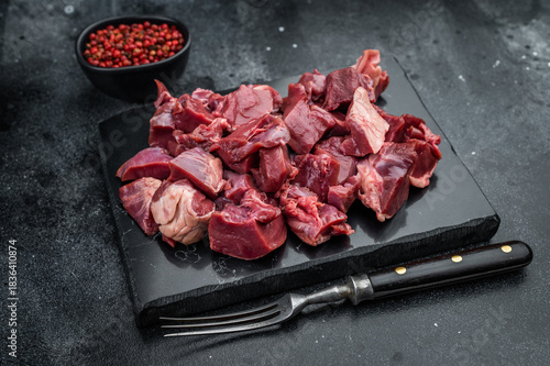 Photography Raw diced veal and lamb heart for cooking, great for rustic meals, aromatic broths and nutrient rich organ meat recipes