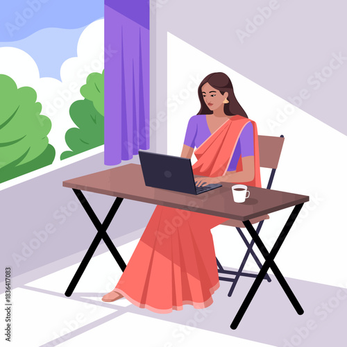 A woman in elegant traditional attire sitting at a desk working on her laptop, exuding a blend of modernity and culture while looking out at a sunny natural landscape.