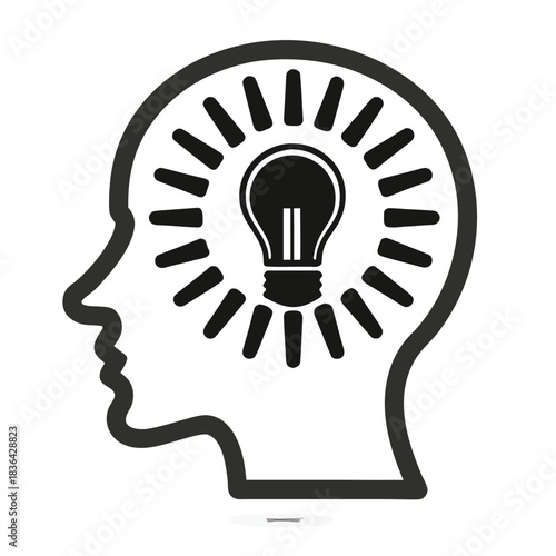 Idea generation shown with radiating light bulb silhouette inside a human head profile