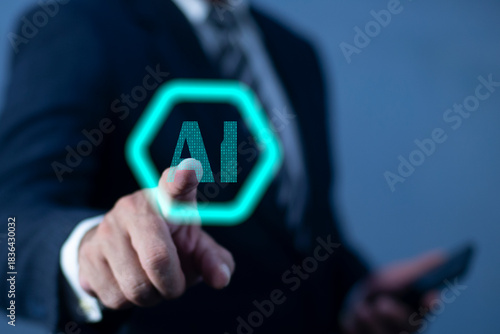 Businessman touching a futuristic AI interface with a glowing blue holographic display. AI Learning and Artificial Intelligence Concept. Business, modern technology concept.
