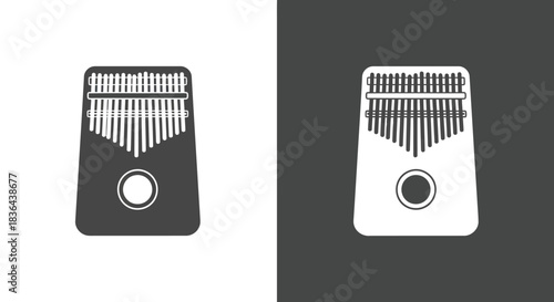 Two kalimbas with different color schemes