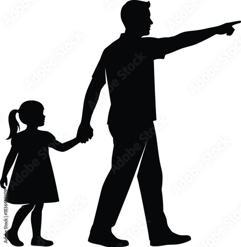 Silhouette of a father and his young daughter holding hands, walking together while the man points into the .