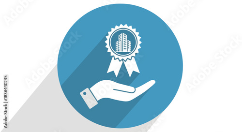 Hand holding a building award