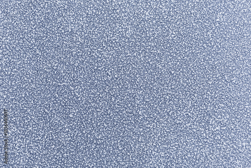 The surface is covered with frost. New Year and Christmas background. Copy space, Soft focus, selective focus