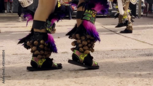 Vibrant street scene featuring dancers and jingling accessories