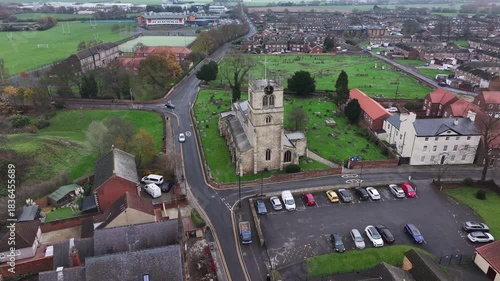 Aerial Video of Thorne Church South Yorkshire. .Thorne is a market town and civil parish in the City of Doncaster in South Yorkshire, England. It was historically part of the West Riding of Yorkshire.