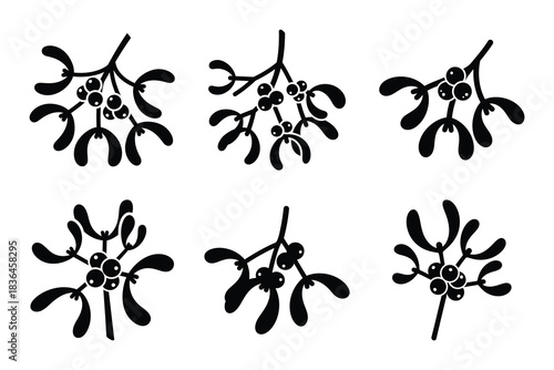 Christmas mistletoe branch icon set. Vector illustration of silhouette icons.