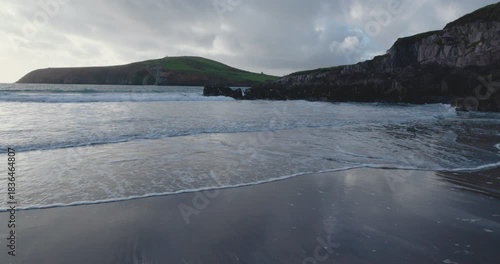 Exploring the Kerry region in Ireland with views of the ocean and shore at sunset
