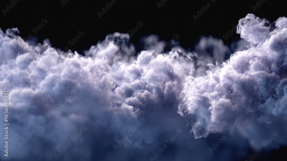Fototapeta premium A large cloud of white and gray clouds in the sky. The clouds are fluffy and appear to be moving slowly, creating a sense of calm and tranquility