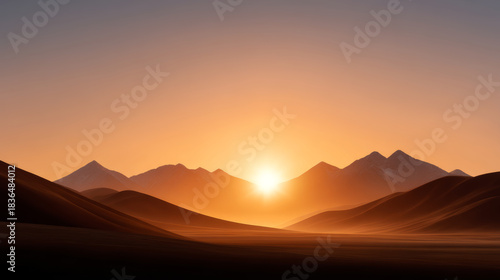 Radiant mountain range silhouette glows with golden sun. Serene and peaceful