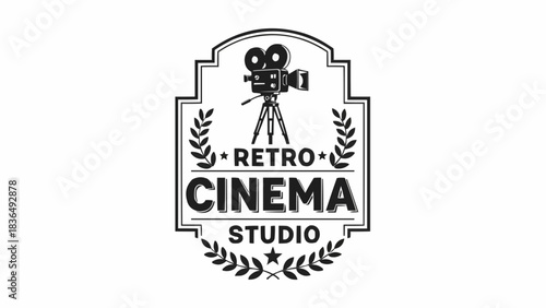 Retro Cinema Studio Logo with Vintage Camera and Laurel Wreath.