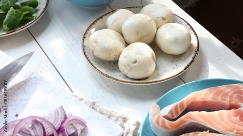 Chef slicing red onion for a healthy meal preparation